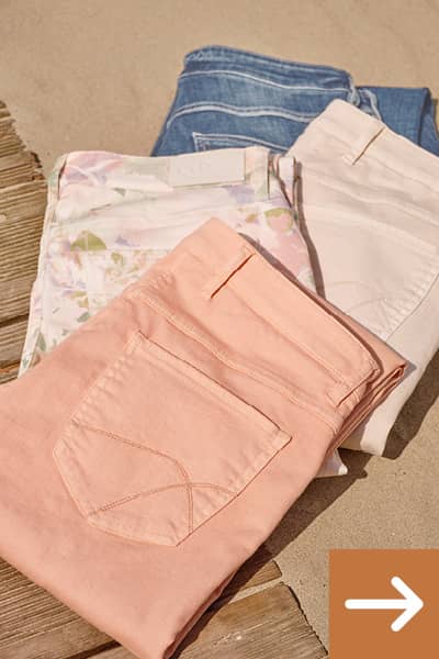 Auswahl an sommerlichen Damenhosen von coral über floralen Druck bis zum klassischen blauen Denim-Stoff.