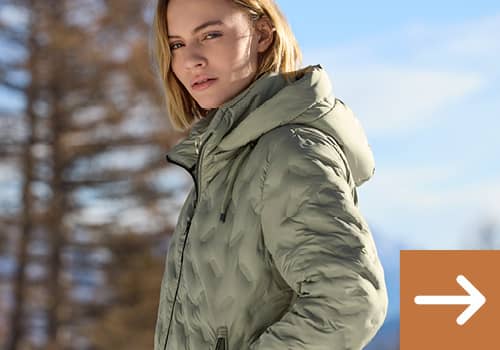 Frau in winterlicher Steppjacke